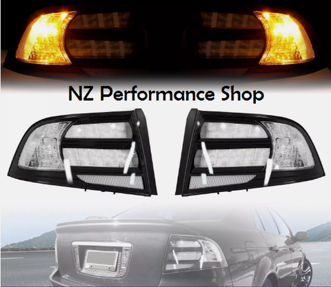 calaveras Acura TL 2004-2008 carcasa negra lente transparente halógena