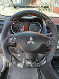 Volante en fibra de carbono forjado y alcántara Mitsubishi Lancer 2007 - 2017
